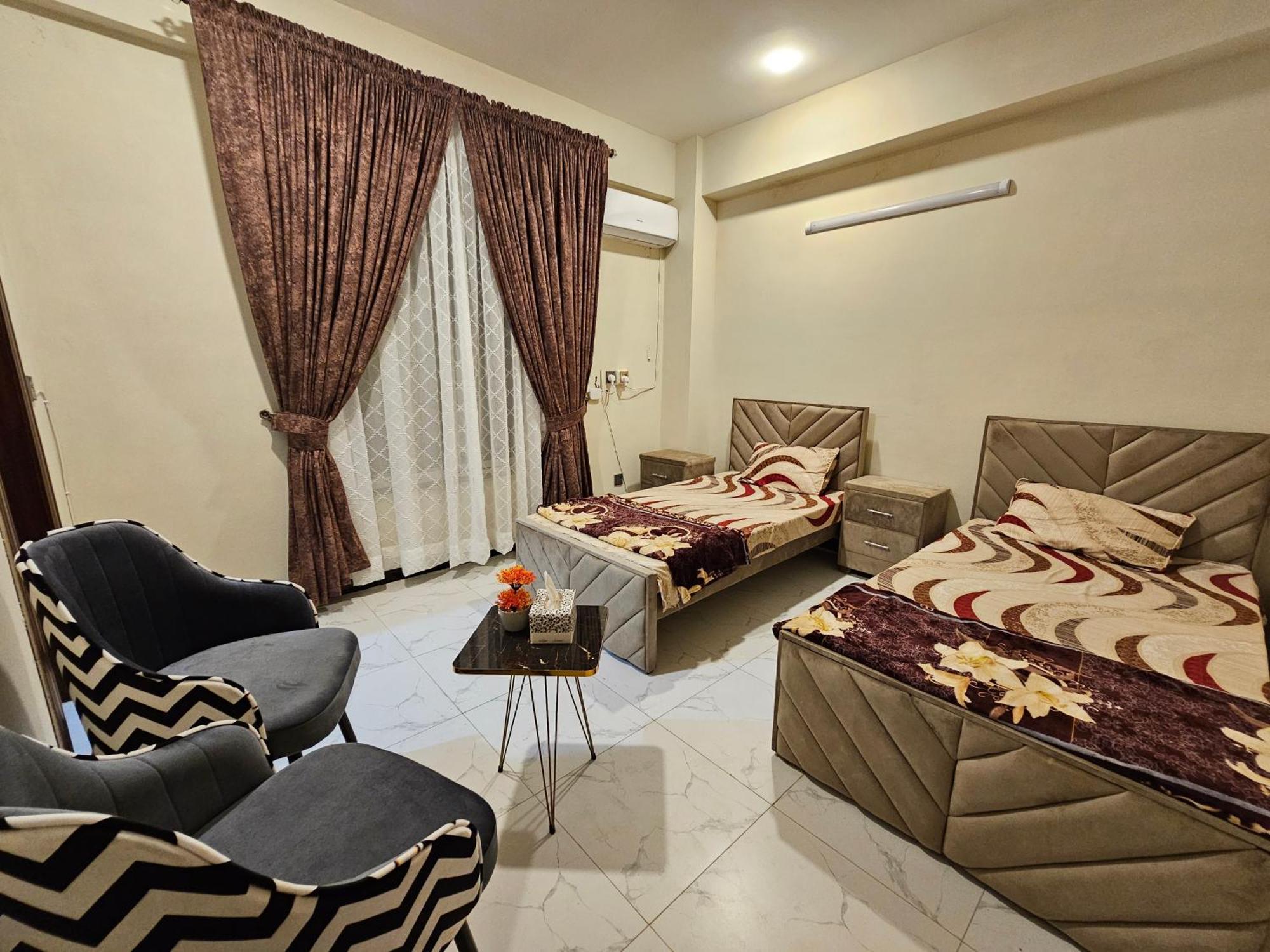 Motorway Majesty Suites Islamabad - Near Islamabad International Airport And Motorway Rum bild