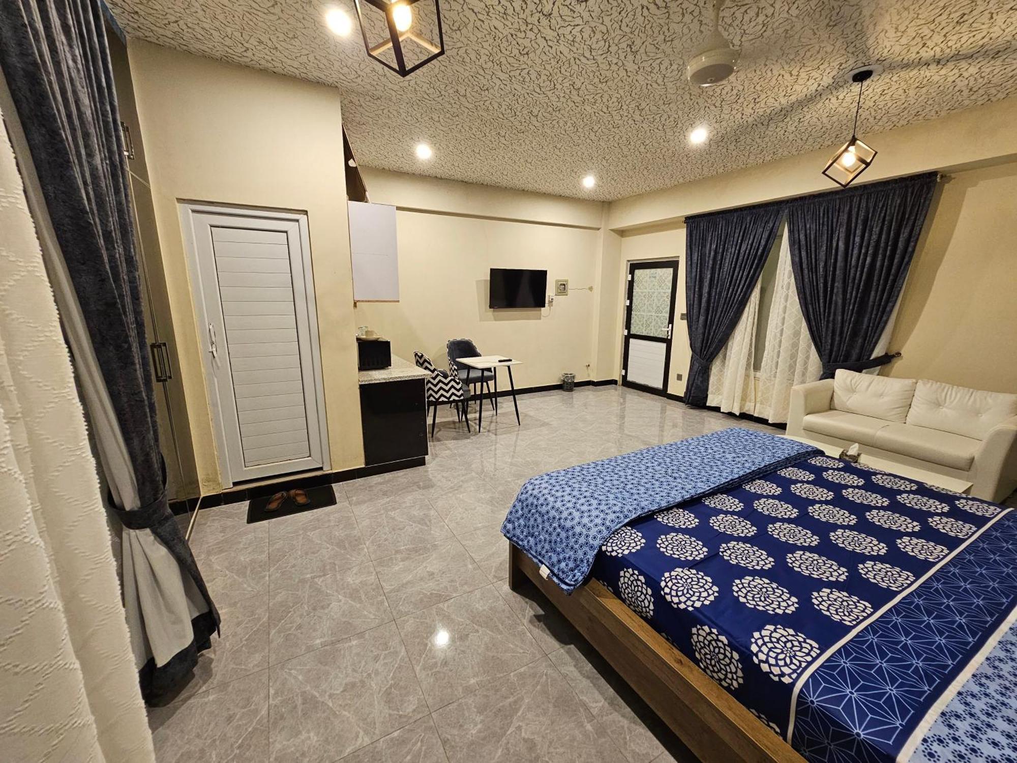 Motorway Majesty Suites Islamabad - Near Islamabad International Airport And Motorway Rum bild